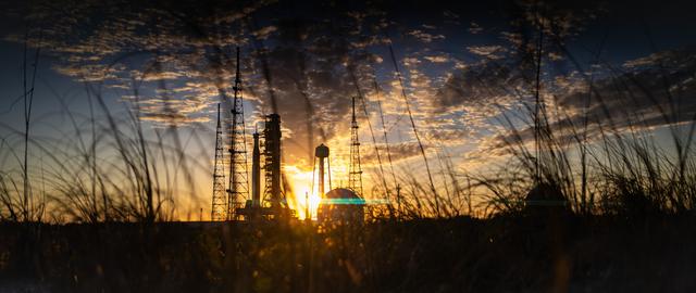 NASA image: Sun sets on Full Artemis II Stack at Launch Pad 39B Anamorphic